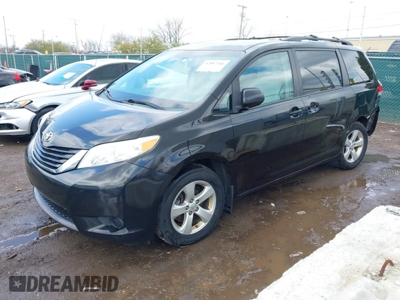 2013 Toyota Sienna LE AAS with VIN 5TDKK3DC8DS401419, listed as a IAAI auction lot 42007146 with 182,651 mi miles. Bid and sale history available at carsss.com. Image 2.