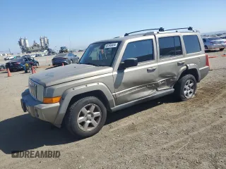 2006 Jeep Commander Limited with VIN 1J8HH58N36C107178, listed as a Copart auction lot 61193434 with 102,399 mi miles and Salvage Title. Bid and sale history available at carsss.com. Image 1.