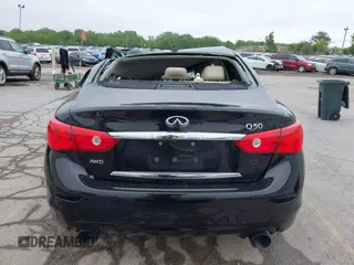 2015 Infiniti Q50 Premium with VIN JN1BV7AR8FM396828, listed as a IAAI auction lot 42313019 with 130,707 mi miles and . Bid and sale history available at DreamBid. Image 15.