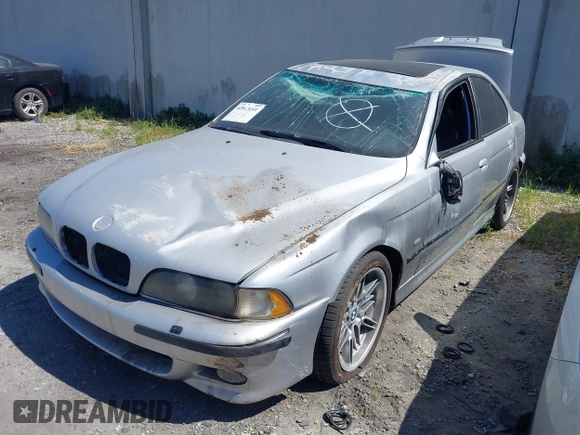 2000 BMW M5 z VIN WBSDE9349YBZ96946, wystawiony jako IAAI lot #42043141 z przebiegiem 107 000 mil mil oraz . Historia ofert i sprzedaży dostępna na DreamBid. Obrazek 2.