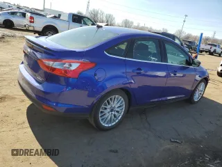2014 Ford Focus Titanium with VIN 1FADP3J25EL304595, listed as a Copart auction lot 49573805 with 82,233 mi miles and Clean Title. Bid and sale history available at carsss.com. Image 3.
