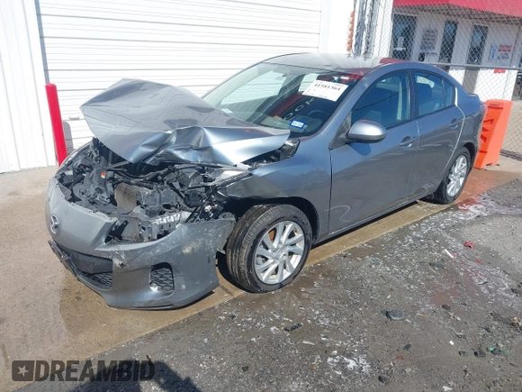 2012 Mazda Mazda3 i Touring with VIN JM1BL1V72C1579695, listed as a IAAI auction lot 41581364 with 126,535 mi miles. Bid and sale history available at carsss.com. Image 2.