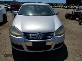 2009 Volkswagen Jetta S with VIN 3VWJZ71K39M149271, listed as a Copart auction lot 64703065 with 214,011 mi miles and Clean title. Bid and sale history available at DreamBid. Image 5.