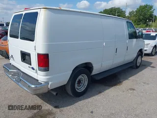 2009 Ford Econoline Cargo Commercial with VIN 1FTNE14W29DA58533, listed as a IAAI auction lot 42083708 with 42,235 mi miles and . Bid and sale history available at DreamBid. Image 4.