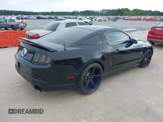 2011 Ford Mustang GT with VIN 1ZVBP8CF5B5150580, listed as a IAAI auction lot 39735125 with 95,737 mi miles. Bid and sale history available at carsss.com. Image 4.