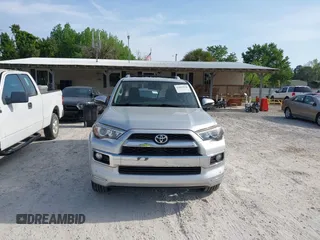 2014 Toyota 4Runner Limited with VIN JTEBU5JR9E5182133, listed as a IAAI auction lot 42081836 with 129,000 mi miles. Bid and sale history available at carsss.com. Image 12.