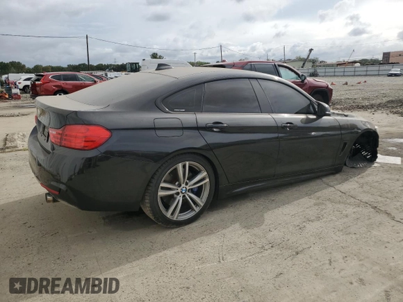 2015 BMW 4 Series 435i xDrive z VIN WBA4B3C55FD669612, wystawiony jako Copart lot #71537464 z przebiegiem 89 676 mil mil oraz Szkoda całkowita • Salvage title. Historia ofert i sprzedaży dostępna na DreamBid. Obrazek 3.