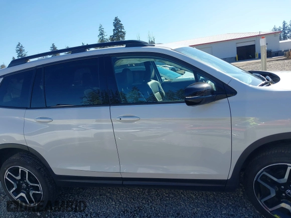 2023 Honda Passport Elite with VIN 5FNYF8H01PB004087, listed as a IAAI auction lot 42045433 with 20,677 mi miles and . Bid and sale history available at DreamBid. Image 13.
