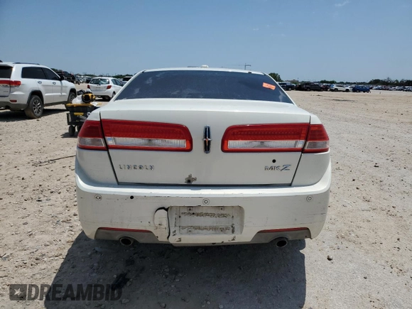 2012 Lincoln MKZ z VIN 3LNHL2GCXCR811391, wystawiony jako Copart lot #56147535 z przebiegiem Nie podano mil oraz Szkoda całkowita • Salvage title. Historia ofert i sprzedaży dostępna na DreamBid. Obrazek 6.
