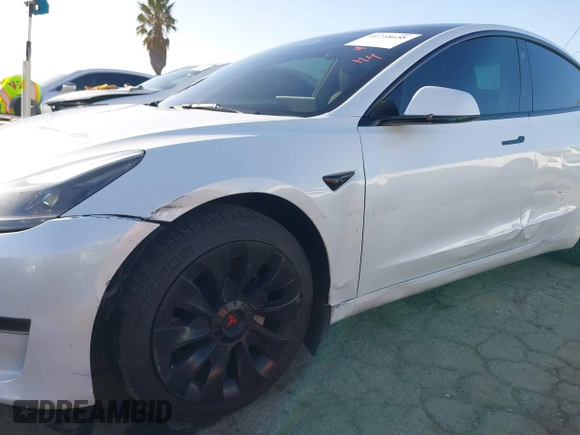 2023 Tesla Model 3 with VIN 5YJ3E1EA0PF503352, listed as a IAAI auction lot 41718658 with 28,426 mi miles and . Bid and sale history available at DreamBid. Image 6.
