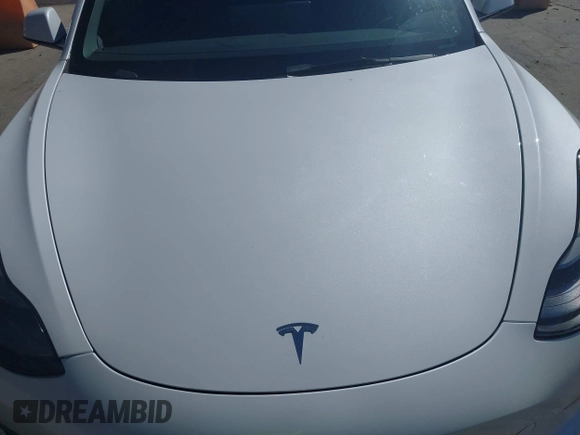 2022 Tesla Model 3 Long Range z VIN 5YJ3E1EB8NF212930, wystawiony jako IAAI lot #41658127 z przebiegiem 43 773 mil mil oraz . Historia ofert i sprzedaży dostępna na DreamBid. Obrazek 10.