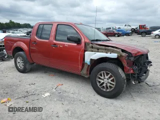 2015 Nissan Frontier SV with VIN 1N6AD0ER1FN708055, listed as a Copart auction lot 61051315 with 139,647 mi miles and Salvage title. Bid and sale history available at DreamBid. Image 4.