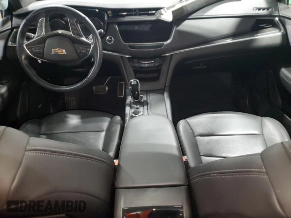 2021 Cadillac XT5 AWD Sport with VIN 1GYKNGRS5MZ142444, listed as a Copart auction lot 54502285 with 27,070 mi miles and Salvage title. Bid and sale history available at DreamBid. Image 8.