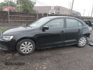2014 Volkswagen Jetta S with VIN 3VW2K7AJ7EM435702, listed as a IAAI auction lot 42434400 with 117,953 mi miles and . Bid and sale history available at DreamBid. Image 14.