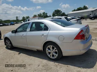 2012 Ford Fusion SE with VIN 3FAHP0HA1CR146333, listed as a Copart auction lot 61265935 with 158,480 mi miles and Salvage title. Bid and sale history available at DreamBid. Image 2.