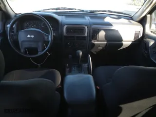 2002 Jeep Grand Cherokee Laredo with VIN 1J4GW48S82C241889, listed as a Copart auction lot 46252045 with 215,697 mi miles and Salvage Title. Bid and sale history available at carsss.com. Image 8.