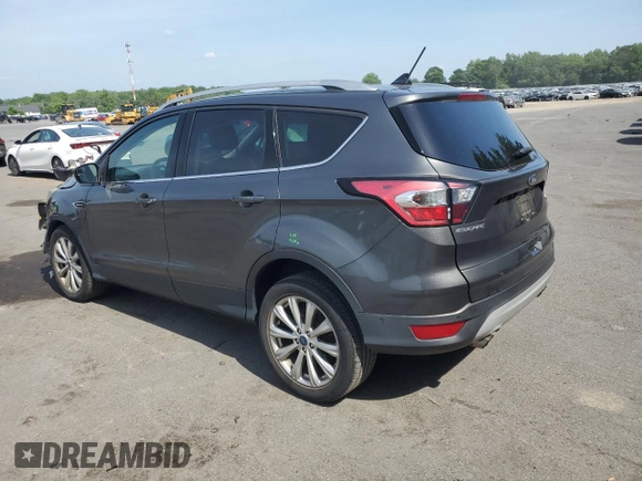 2018 Ford Escape Titanium with VIN 1FMCU9J91JUA47420, listed as a Copart auction lot 61846795 with 77,246 mi miles and Salvage title. Bid and sale history available at DreamBid. Image 2.