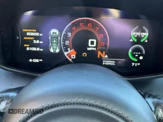 2018 McLaren 570S z VIN SBM13FAA2JW004563, wystawiony jako Copart lot #51371545 z przebiegiem 20 602 mil mil oraz Tytuł czysty. Historia ofert i sprzedaży dostępna na DreamBid. Obrazek 8.