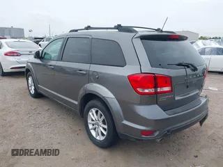 2013 Dodge Journey SXT with VIN 3C4PDDBGXDT650886, listed as a IAAI auction lot 41864331 with 224,579 mi miles and . Bid and sale history available at DreamBid. Image 3.