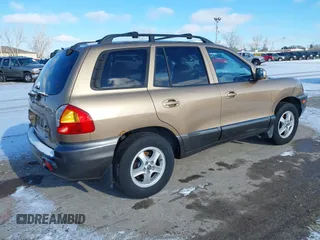 2002 Hyundai Santa Fe GLS with VIN KM8SC73D62U316002, listed as a IAAI auction lot 41249855 with Not Provided miles. Bid and sale history available at carsss.com. Image 4.