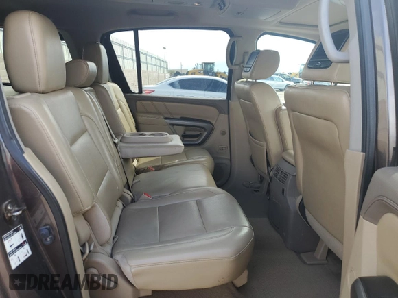2015 Nissan Armada Platinum z VIN 5N1AA0NC6FN602610, wystawiony jako Copart lot #69121314 z przebiegiem 117 166 mil mil oraz Szkoda całkowita • Salvage title. Historia ofert i sprzedaży dostępna na DreamBid. Obrazek 11.