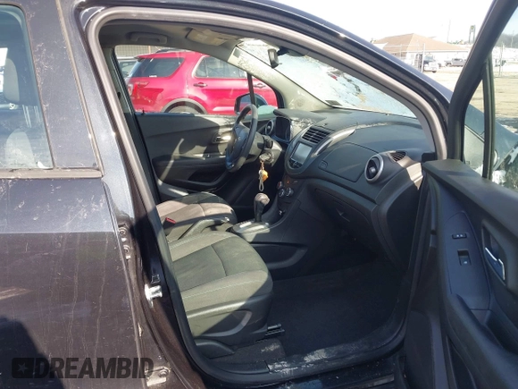 2016 Chevrolet Trax LS with VIN KL7CJNSB9GB600288, listed as a IAAI auction lot 41614215 with 73,486 mi miles. Bid and sale history available at carsss.com. Image 5.