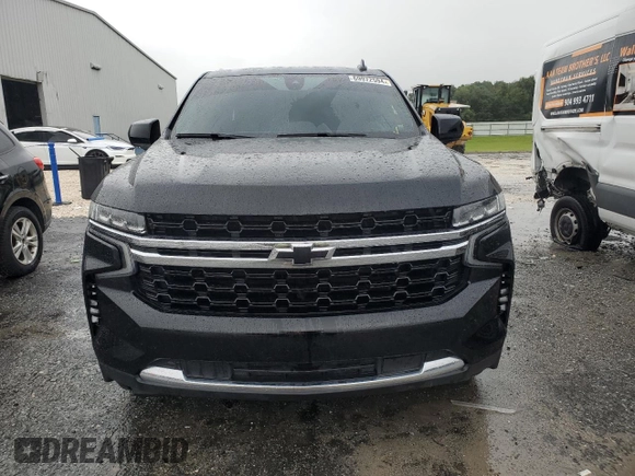 2021 Chevrolet Tahoe LS with VIN 1GNSCMKD4MR335973, listed as a Copart auction lot 69972594 with 42,129 mi miles and Salvage title. Bid and sale history available at DreamBid. Image 5.