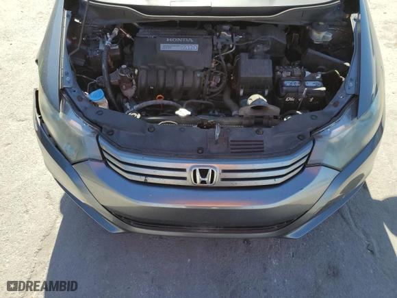 2011 Honda Insight EX with VIN JHMZE2H73BS012509, listed as a Copart auction lot 52590455 with 141,500 mi miles and Salvage Title. Bid and sale history available at carsss.com. Image 11.