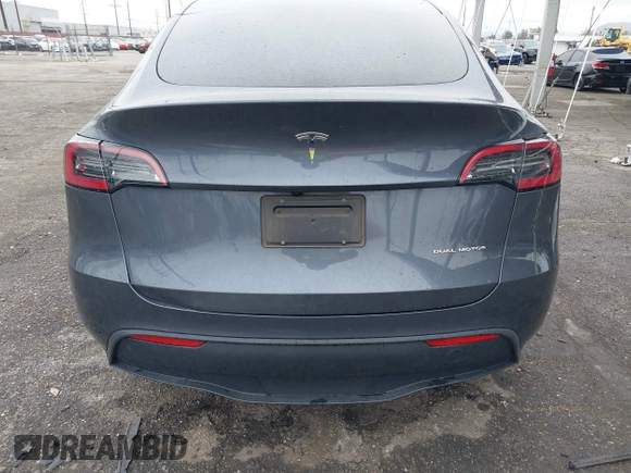 2023 Tesla Model Y Long Range with VIN 7SAYGDEE3PA152683, listed as a IAAI auction lot 41798988 with 14,063 mi miles and . Bid and sale history available at carsss.com. Image 16.