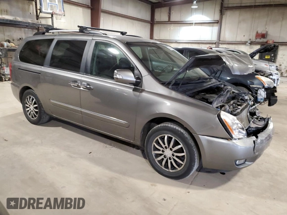 2011 Kia Sedona EX with VIN KNDMH4C79B6398495, listed as a Copart auction lot 47064174 with 169,328 mi miles and Salvage Title. Bid and sale history available at carsss.com. Image 4.