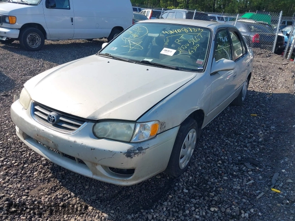 2001 Toyota Corolla CE with VIN 2T1BR12E61C473602, listed as a IAAI auction lot 42408733 with Not provided miles and . Bid and sale history available at DreamBid. Image 2.