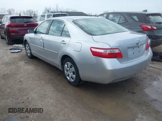 2009 Toyota Camry with VIN 4T1BE46K19U392840, listed as a IAAI auction lot 42056237 with 210,221 mi miles. Bid and sale history available at carsss.com. Image 3.