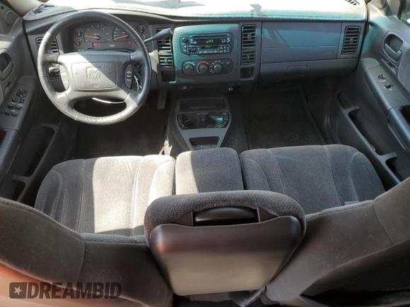 2001 Dodge Dakota с VIN 1B7HL2AX31S278317, выставлен на аукционе Copart как лот 55467745 с пробегом 86 799 миль миль и Чистый • Clean title. История ставок и продаж доступна на DreamBid. Изображение 8.