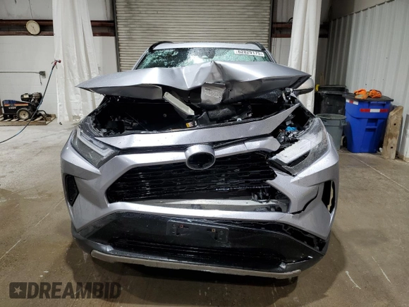 2022 Toyota RAV4 Hybrid SE with VIN JTM16RFVXND052911, listed as a Copart auction lot 62829175 with 84,035 mi miles and Salvage title. Bid and sale history available at DreamBid. Image 5.