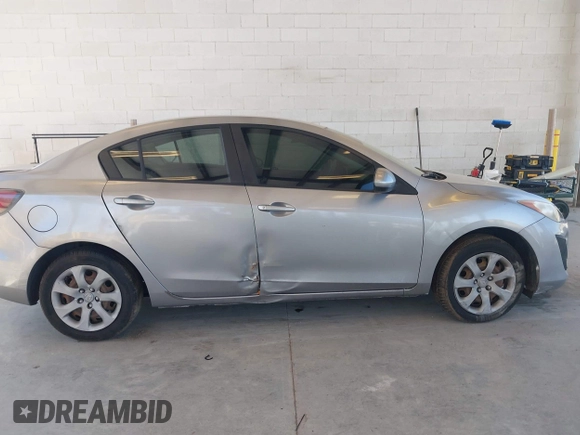 2011 Mazda Mazda3 i Sport with VIN JM1BL1UF4B1433743, listed as a IAAI auction lot 42021606 with 116,288 mi miles. Bid and sale history available at carsss.com. Image 12.