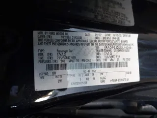 2013 Ford Focus Titanium with VIN 1FADP3J20DL143491, listed as a IAAI auction lot 42034388 with 194,388 mi miles and . Bid and sale history available at carsss.com. Image 9.