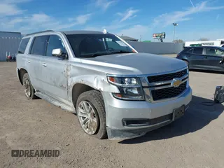 2020 Chevrolet Tahoe LT with VIN 1GNSCBKC5LR226822, listed as a IAAI auction lot 41334853 with 77,091 mi miles and . Bid and sale history available at DreamBid. Image 1.