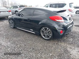 2016 Hyundai Veloster Turbo with VIN KMHTC6AE9GU268920, listed as a IAAI auction lot 42007242 with 188,086 mi miles and . Bid and sale history available at DreamBid. Image 3.