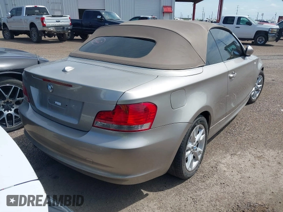 2009 BMW 1 Series 128i with VIN WBAUL73529VJ74898, listed as a IAAI auction lot 42690194 with 134,407 mi miles and . Bid and sale history available at DreamBid. Image 4.