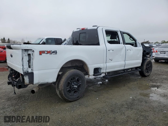 2023 Ford F-250 XL with VIN 1FT8W2BN4PED34325, listed as a Copart auction lot 49441415 with 28,974 mi miles and Salvage Title. Bid and sale history available at DreamBid. Image 3.