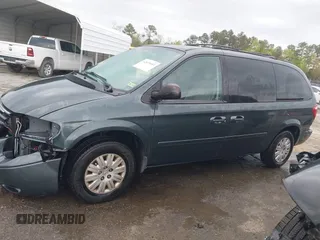2006 Chrysler Town & Country LX with VIN 2A4GP44R96R615942, listed as a IAAI auction lot 42039452 with 158,009 mi miles and . Bid and sale history available at DreamBid. Image 14.