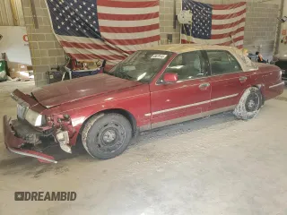 2003 Mercury Grand Marquis GS Convenience with VIN 2MEFM74W73X602954, listed as a Copart auction lot 46679145 with 158,457 mi miles and Salvage Title. Bid and sale history available at DreamBid. Image 1.