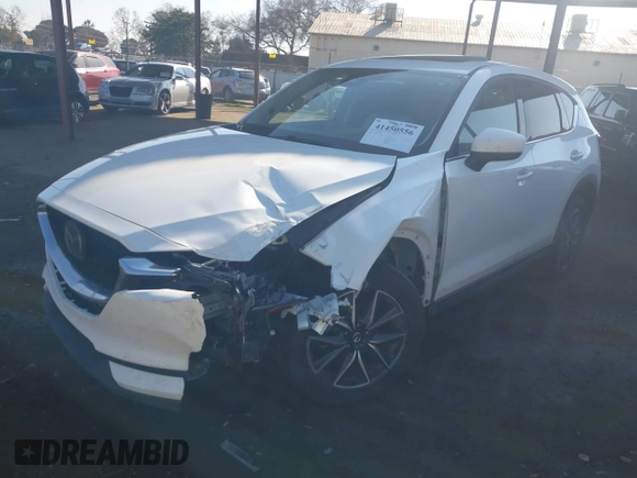 2017 Mazda CX-5 Grand Touring with VIN JM3KFBDL6H0164993, listed as a IAAI auction lot 41450556 with 97,733 mi miles. Bid and sale history available at carsss.com. Image 2.
