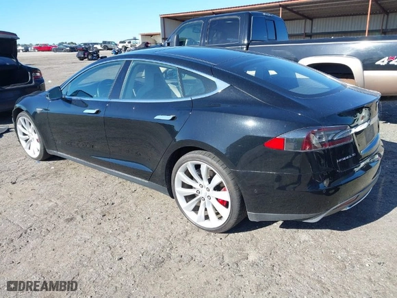 2015 Tesla Model S 85D with VIN 5YJSA4H43FF083602, listed as a IAAI auction lot 41830872 with 67,475 mi miles. Bid and sale history available at carsss.com. Image 3.