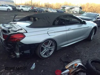 2014 BMW 6 Series 650i with VIN WBAYP9C51ED169287, listed as a IAAI auction lot 32308859 with 48,680 mi miles and . Bid and sale history available at carsss.com. Image 4.