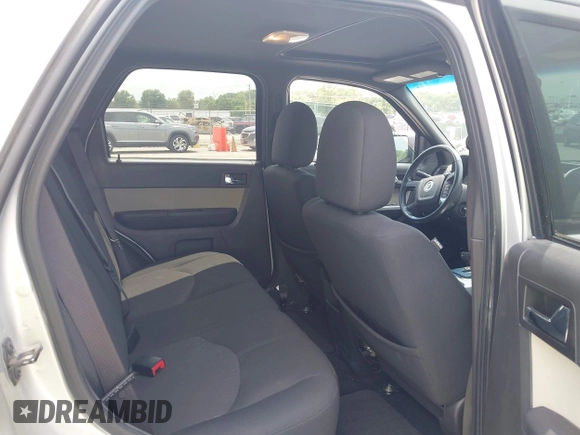 2010 Mercury Mariner with VIN 4M2CN8B77AKJ29263, listed as a IAAI auction lot 42865830 with 138,528 mi miles and . Bid and sale history available at DreamBid. Image 8.