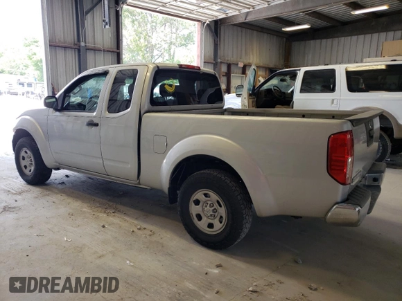 2015 Nissan Frontier SV with VIN 1N6BD0CT1FN713999, listed as a Copart auction lot 62053944 with 104,667 mi miles and Salvage title. Bid and sale history available at DreamBid. Image 2.