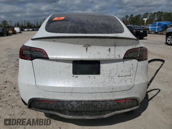 2024 Tesla Model Y Long Range with VIN 7SAYGDEE2RA335818, listed as a Copart auction lot 48821475 with 4,415 mi miles and Salvage Title. Bid and sale history available at DreamBid. Image 6.