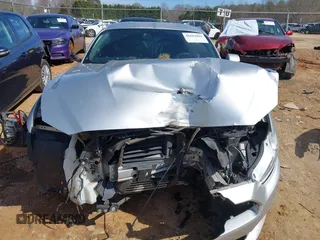 2017 Ford Mustang EcoBoost с VIN 1FA6P8THXH5281735, выставлен на аукционе IAAI как лот 41612961 с пробегом 90 130 миль миль и . История ставок и продаж доступна на DreamBid. Изображение 12.