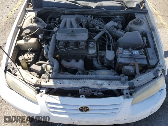 1998 Toyota Camry LE z VIN JT2BF28K3W0115122, wystawiony jako Copart lot #52645095 z przebiegiem 361 549 mil mil oraz Szkoda całkowita • Salvage title. Historia ofert i sprzedaży dostępna na DreamBid. Obrazek 13.